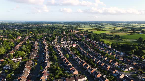 Ariel view of Kenilworth town in Warwickshire. residential area and historic Kenilworth castle in ba