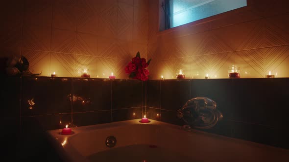 Romantic Bathtub with Red Candles and Sauna in the Hotel