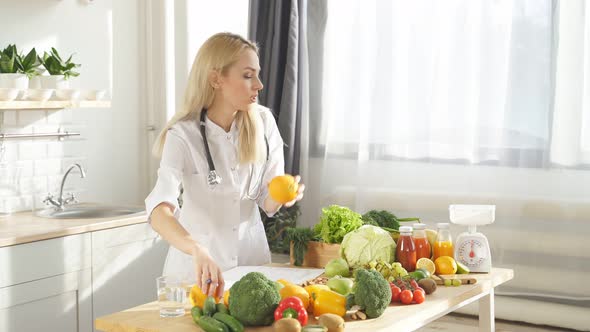 The Nutritionist Has Put a Lot of Fruits and Vegetables on the Table She Wants to Show