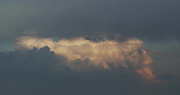 A Large Cloud Covered By Another Darker Timelapse alt