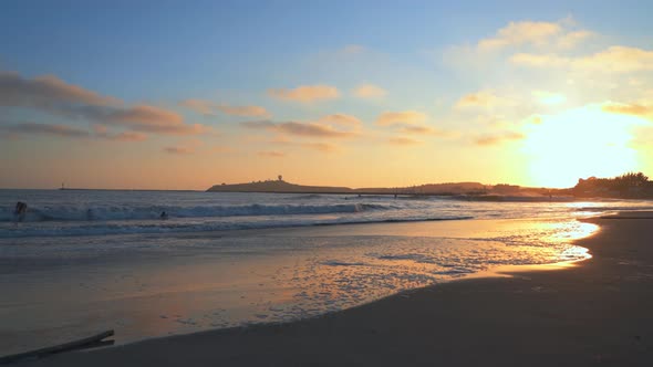 Pillar Point from El Granada, Cloudy Sky, Beatiful Sunset and Surfers Riding the Waves