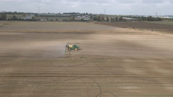 tractor harvest at southern district field in sdot negev, israel