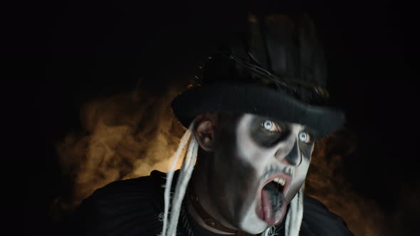 Frightening Man in Skeleton Halloween Makeup Making Angry Faces, Shaking Head, Showing Tongue