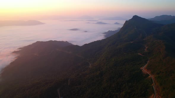 Flying over the clouds during morning sunrise.  wonderful morning sunrise natural Landscape.