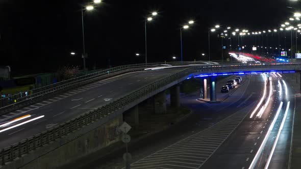 Lights Of Cars On The Road Of A Big Night City, Time Lapse, Bridge