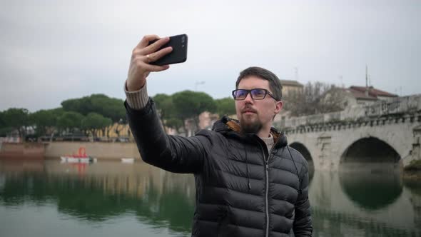 Man Is Photographing Himself By Mobile Phone