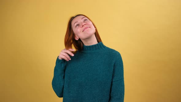 Young Red Hair Woman Posing Isolated on Yellow Color Background Studio