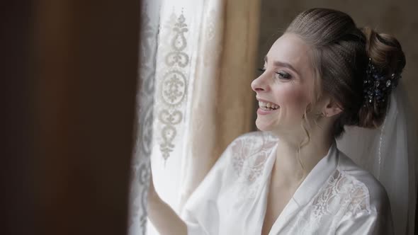 Beautiful and Lovely Bride in Night Gown and Veil. Wedding Morning. Slow Motion