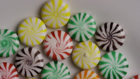 Rotating shot of a colorful mix of various hard candies