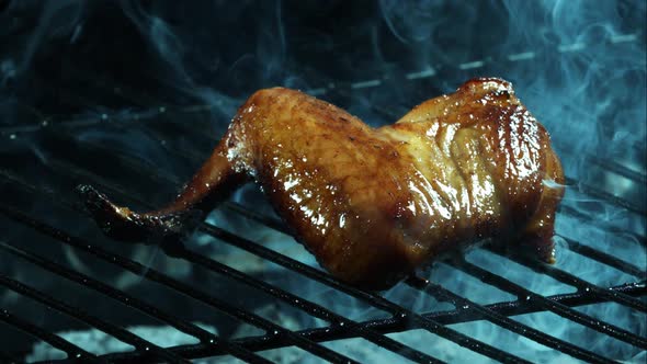 Grilling BBQ Chicken Wings in ultra slow motion 1500fps on a Wood Smoked Grill - BBQ PHANTOM 011