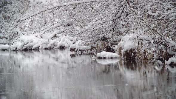 River Coast Covered with White Snow