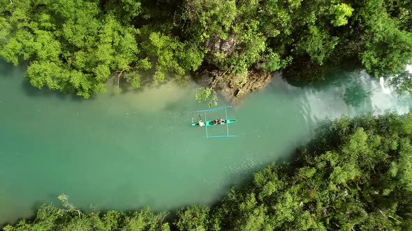Aerial view of traditional fishing boats in Bojo River, Aloguinsan, Philippines.