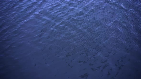 Abstract Water Surface View From Above Dark Background
