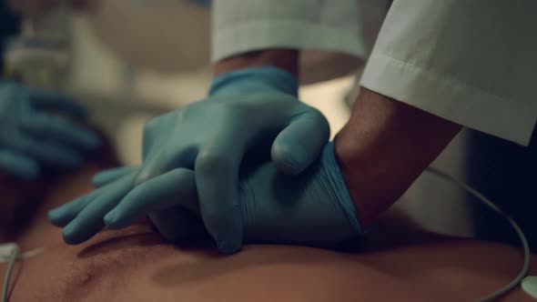 Doctor Give Resuscitation to Dying Patient Closeup