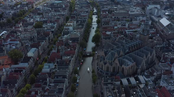 Amsterdam Canal and Old Cathedral From Drone Perspective, Crane