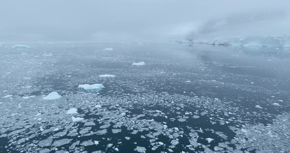 fog over brash ice on water