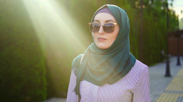 Portrait of a Stylish Muslim Woman in Hijabsunflare