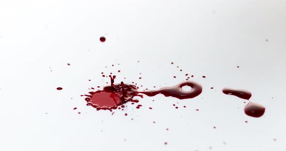 900094 Blood Dripping against White Background, Slow Motion 4K
