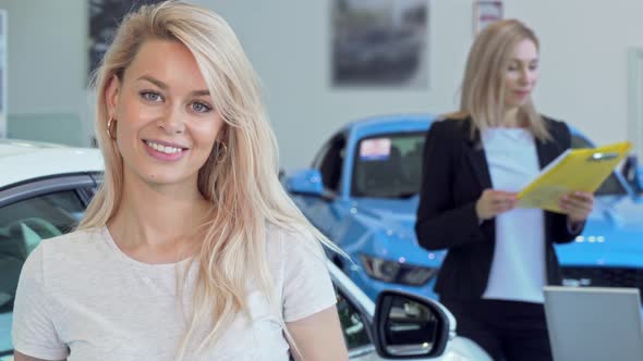 Gorgeous Happy Woman Smiling, Holding Car Keys After Buying New Auto