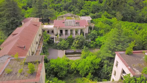 Historical Derelict Sanatorium Medea in Tskaltubo, Georgia during sunset