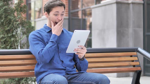 Wow, Surprised Young Man Using Tablet in shock