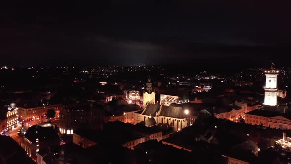 Night cityscape of old European city. Lviv city with beautiful ancient architecture. Aerial view