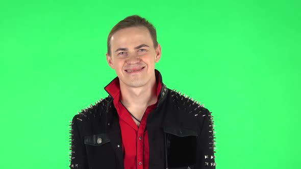 Man Smiling While Looking at Camera. Green Screen