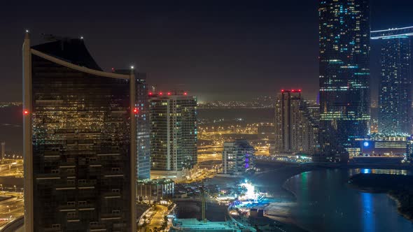 Buildings on Al Reem Island in Abu Dhabi Night Timelapse From Above