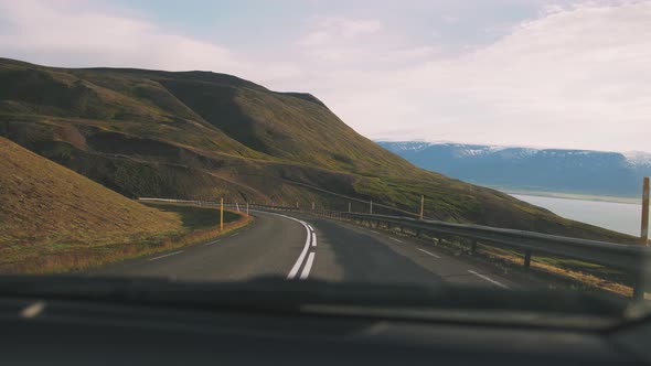 Drivers Perspective of Mountain Road in Iceland POV View From Car Window