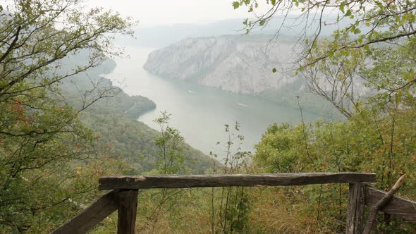 Panning on narrowest point of big river flow 4K 2160p 30fps UltraHD footage - Beautiful Danube gorge