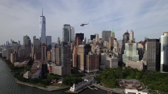 Helicopter flying over skyscrapers, in Manhattan, New York, USA - Aerial view