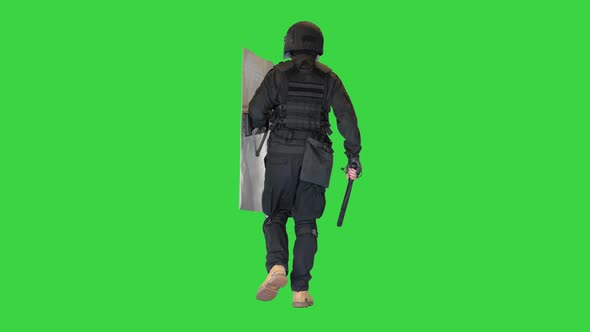 Riot Police Unit Walking with a Shield and Baton on a Green Screen Chroma Key