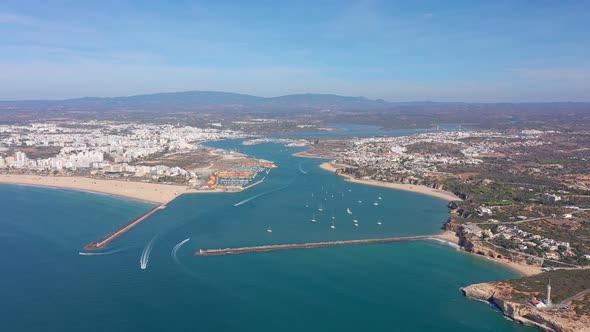 Aerial View of the Bay of the Portuguese Marina in the Tourist Town of Portimao Breakwaters and
