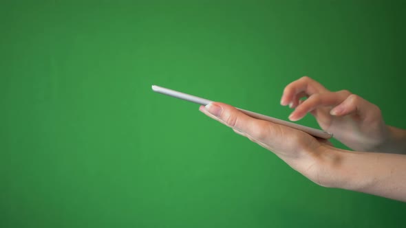 Girl Use Tablet Isolated On Chroma Key Green Screen Background