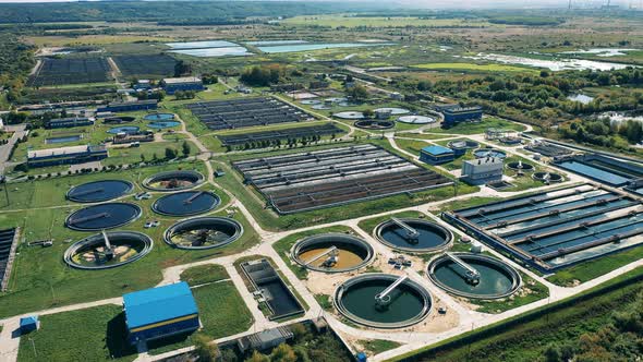 Drone View of a Vast Sewage Treatment Facility in Daylight