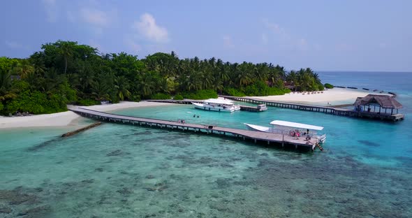 Natural flying island view of a summer white paradise sand beach and aqua blue ocean background 