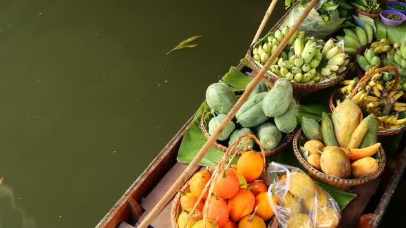 Iconic Asian Lat Mayom Floating Market. Khlong River Canal, Long-tail Boat with Tropical Exotic