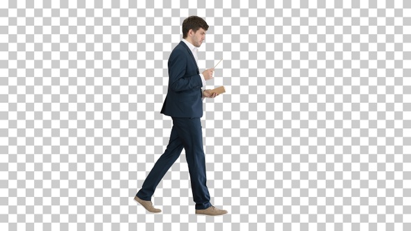 Businessman walking and writing down his ideas, Alpha Channel