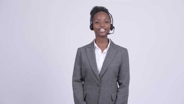 Young Beautiful African Businesswoman As Call Center Representative Talking