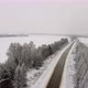 Aerial View of Passing Cars on a Winter Road - VideoHive Item for Sale