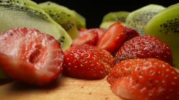 Red Strawberrues and Pieces of Kiwi