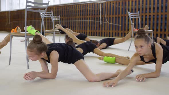 Teenage Girls Practicing Side Splits