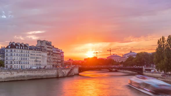 People and Boats Timelapse Le Pont D'Arcole Bridge at Sunset Paris France Europe