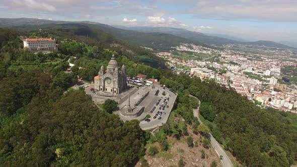 Beautiful Catholic Church with the Picturesque Nature on the Background