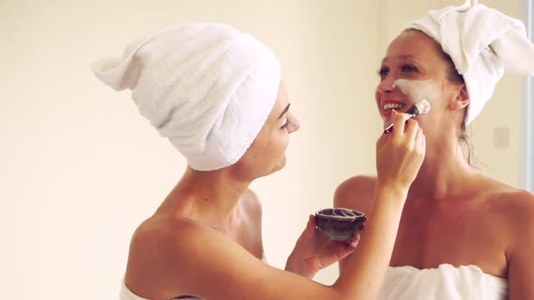 Beautiful Woman Having a Facial Treatment at Spa