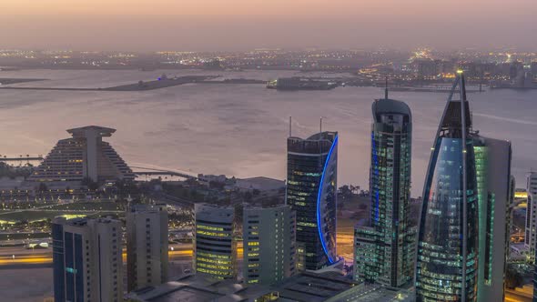 The Skyline of the West Bay Area From Top in Doha Night to Day Timelapse Qatar