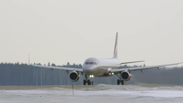 Airbus A320 of Aeroflot taking off, winter shot Moscow