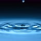 Abstract Conceptual Macro Slow Motion Water Drop in Clear Water on Cosmetic Dark Blue Background - VideoHive Item for Sale