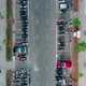 Aerial view of vehicles parked near building in India - VideoHive Item for Sale