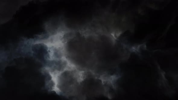 4k enter the dark clouds with a thunderstorm in dark sky